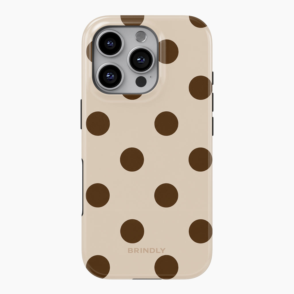 Brindly Mocha Dot phone case with oversized chocolate-brown polka dots on a warm cream background.