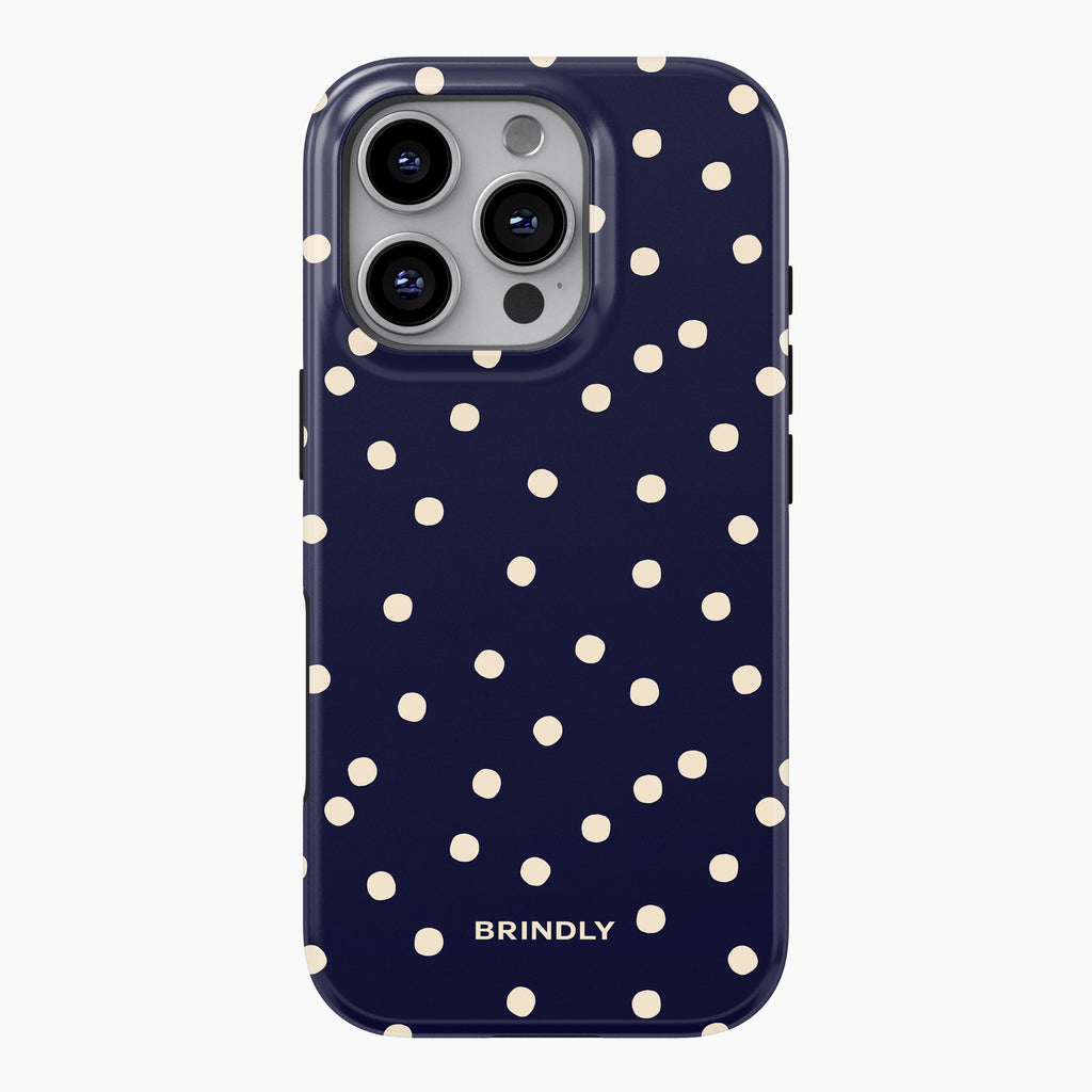 Brindly Polka Perfection phone case with scattered cream polka dots on a deep navy background.